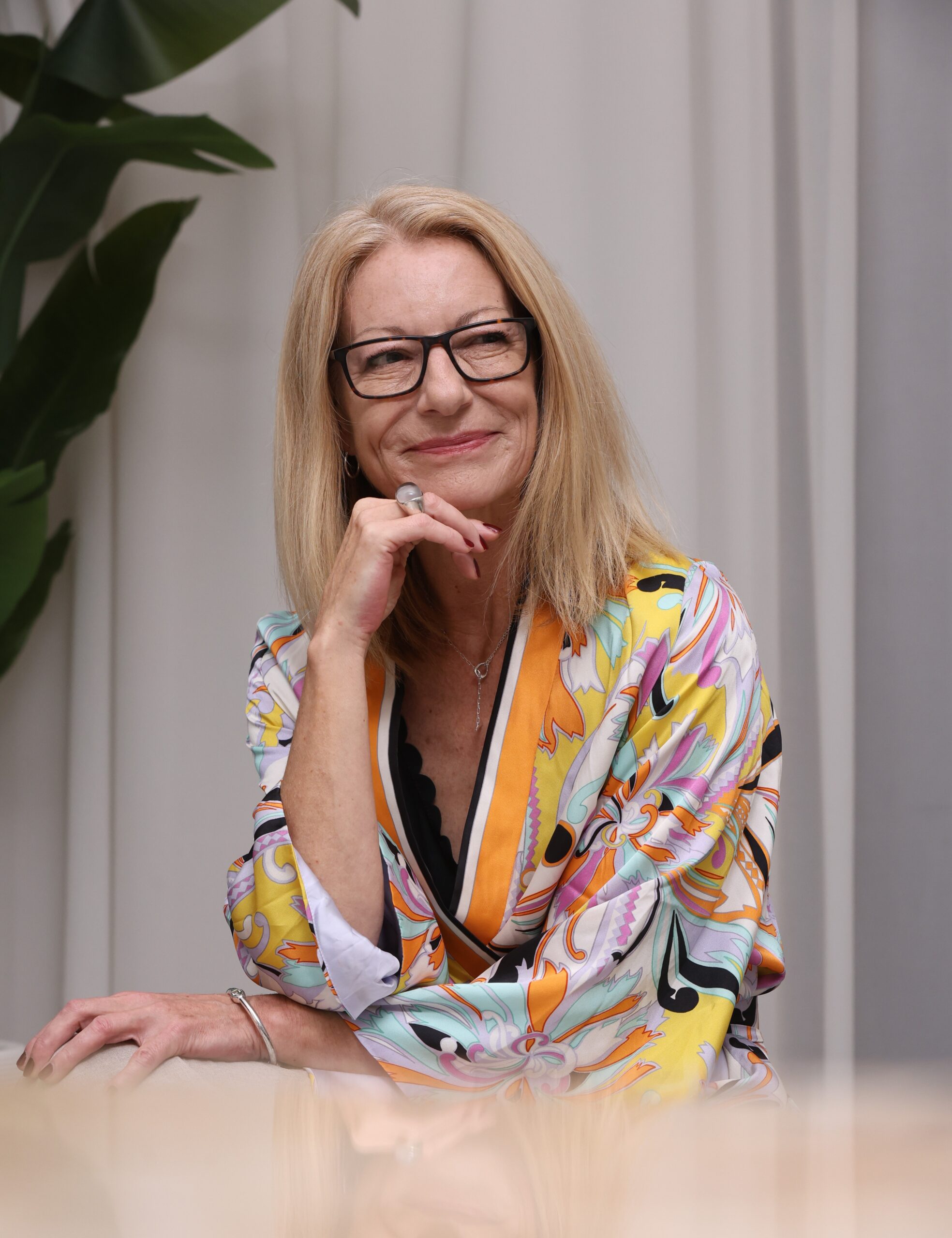 Empowered woman radiating confidence and joy during personal transformation